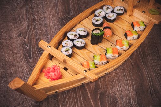 sushi roll, sashimi and nigiri boat set 