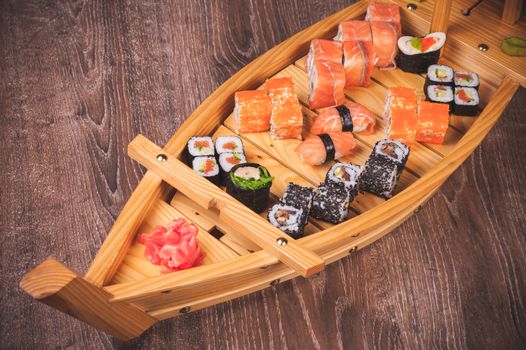 sushi roll, sashimi and nigiri boat set 