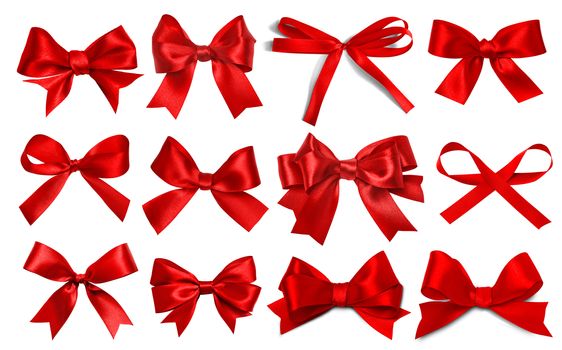 Shiny red satin ribbon on white background