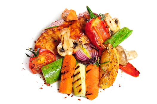 grilled chicken fillet and big pieces of vegetables