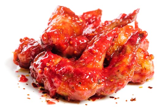 grilled chicken wings in hot raspberry sauce