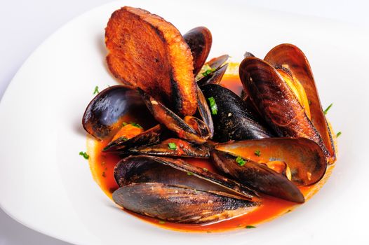 Mussels prepared in italian rustic style with wine and parsley