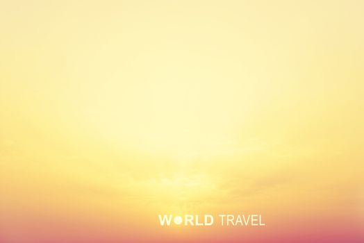 Bright sunrise sky and inscription World Travel