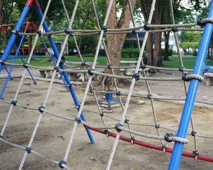 Netting for climbing with a thick rope for children climb on the playground.                                