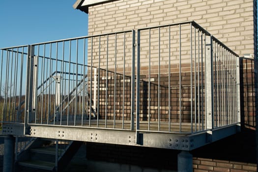 Modern design metal iron balcony in close view                               