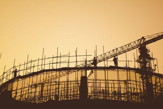 Construction workers and scaffolding 