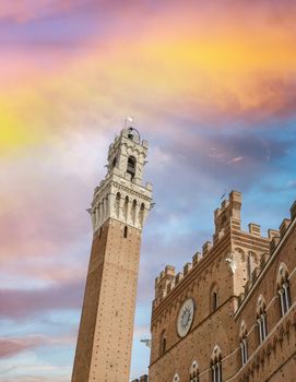 Siena. Mangia Tower in Campo Square at dusk.