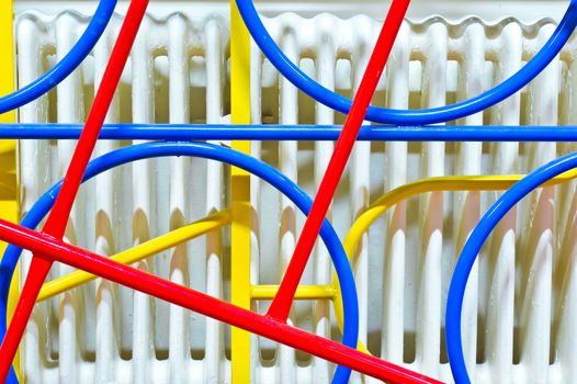 Part of a colourful climbing frame