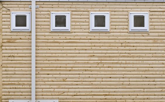 New wooden building with pvc windows