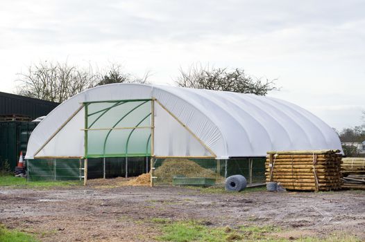 A large cloche frame at a farm in winter