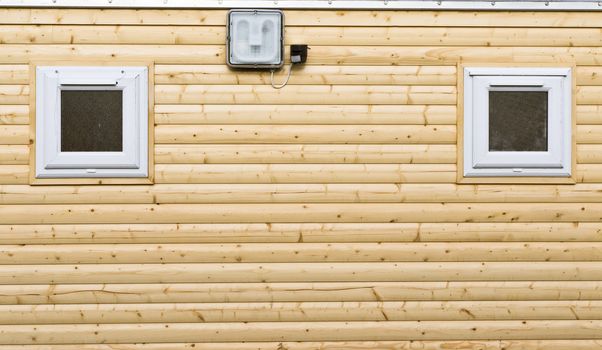 Wooden wall on a new log cabin