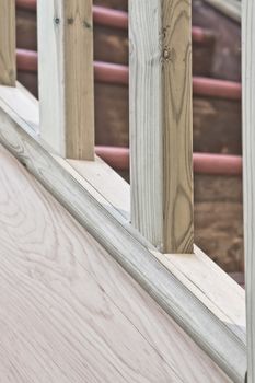 Close up of part of a wooden stair bannister