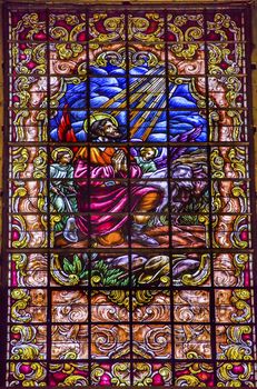 Stained Glass Jesus Praying Angels Basilica Santa Iglesia Collegiata de San Isidro Madrid Spain. Named after Patron Saint of Madrid, Saint Isidore, Church was created in 1651