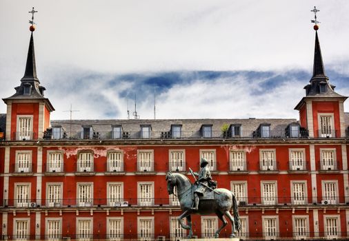 Plaza Mayor Built in the 1617 Famous Square Cityscape Madrid Spain. King Philip III Equestrian Statue created in 1616 by Sculptors Gambologna and Pietro Tacca