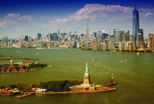 Aerial view of Statue of Liberty and Manhattan, New York City.