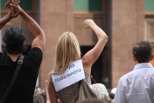 Moscow, Russia - July 18, 2013. Unknown opposition with the inscription Sister Navalny. Thousands of Muscovites went on this day in support of arrested opposition leader Alexei Navalny