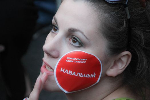 Moscow, Russia - July 18, 2013. Journalist Alexandra Astakhovf at the rally in support of Navalny. Thousands of Muscovites went on this day in support of arrested opposition leader Alexei Navalny