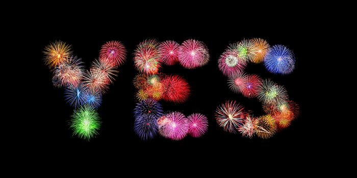 Yes word colorful fireworks text isolated on black background