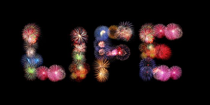 Life word colorful fireworks text isolated on black background