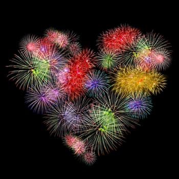 fireworks colorful heart shape on black background