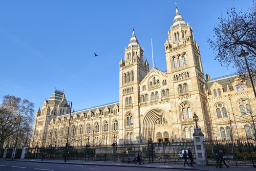LONDON, UK - DECEMBER 20: Facade of the Natural History museum in bright sunny day. December 20, 2014 in London.