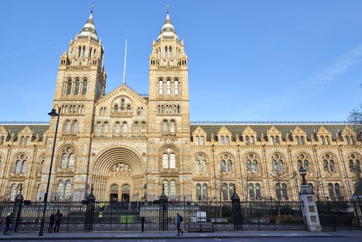 LONDON, UK - DECEMBER 20: Facade of the Natural History museum in bright sunny day. December 20, 2014 in London.