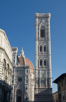 Giotto's bell tower and Duomo in Florence on a clear winter day