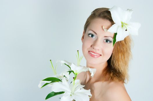 portrait of the girl with a lily flower