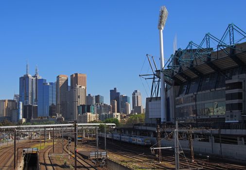 Trains leaving the Melbourne CBD passing the Melbourne Cricket Ground