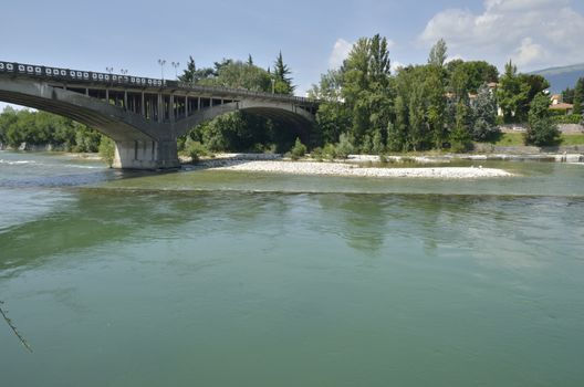 Concrete bridge over the river Brenta in Bassano del Grappa, Italy .