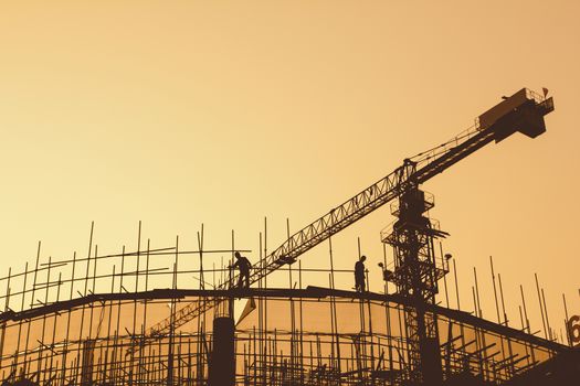 Construction workers and scaffolding 