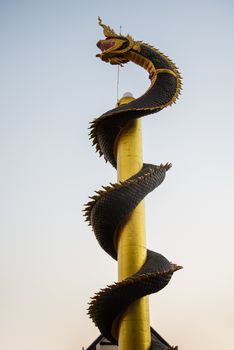 Dragon pillars in the sunset. Shrine