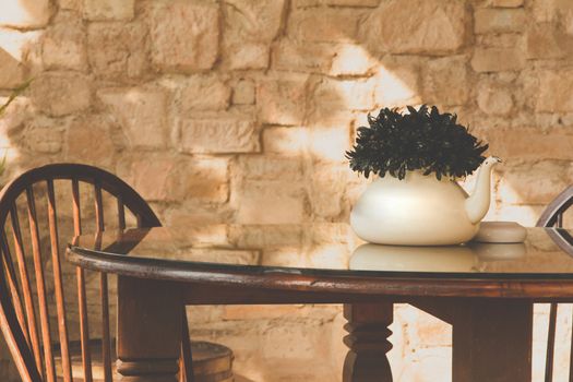 vintage chair and table with flower