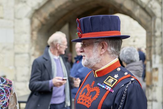 LONDON, UK - NOVEMBER 08: Profile portrait of a traditional Yeomen Warder, popularly known as Beefeaters, at the Tower of London. NOVEMBER 08, 2014 in London.