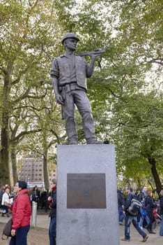 LONDON, UK - NOVEMBER 08: The Building Worker statue, near the Tower of London. NOVEMBER 08, 2014 in London. The statue commemorates construction workers who have lost their lives at work. 
