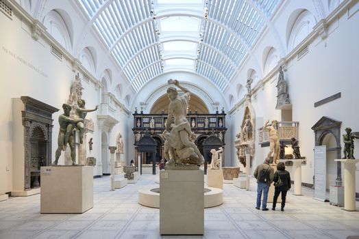 LONDON, UK - DECEMBER 20: Victoria and Albert museum's Medieval and Renaissance room, with statue of Samson slaying a Philistine in the centre. December 20, 2014 in London.