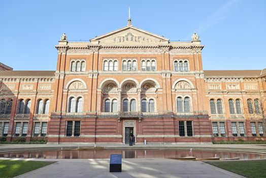 LONDON, UK - DECEMBER 20: Garden entrance to Victoria and Albert museum in bright sunny day. December 20, 2014 in London.
