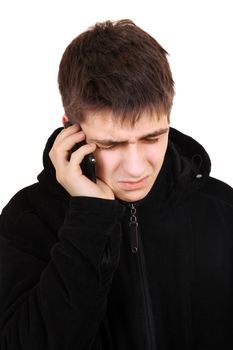 Sad Teenager in the Coat with Cellphone Isolated on the White Background