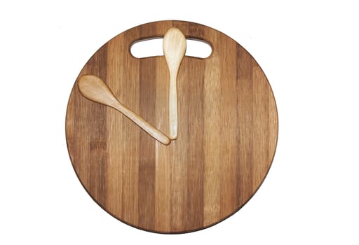 Kitchen board and wooden spoons as wall clock.