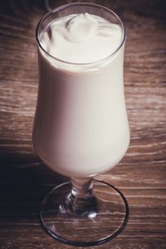 vanilla cacao chocolate milkshake in high glass