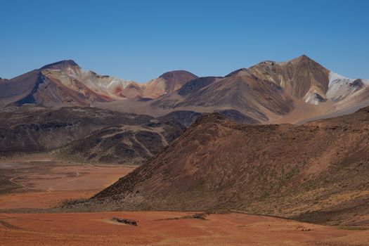 Colourful mountain landscape at Suriplaza in the Atacama Desert of north east Chile. The altitude is in excess of 4,000 metres.