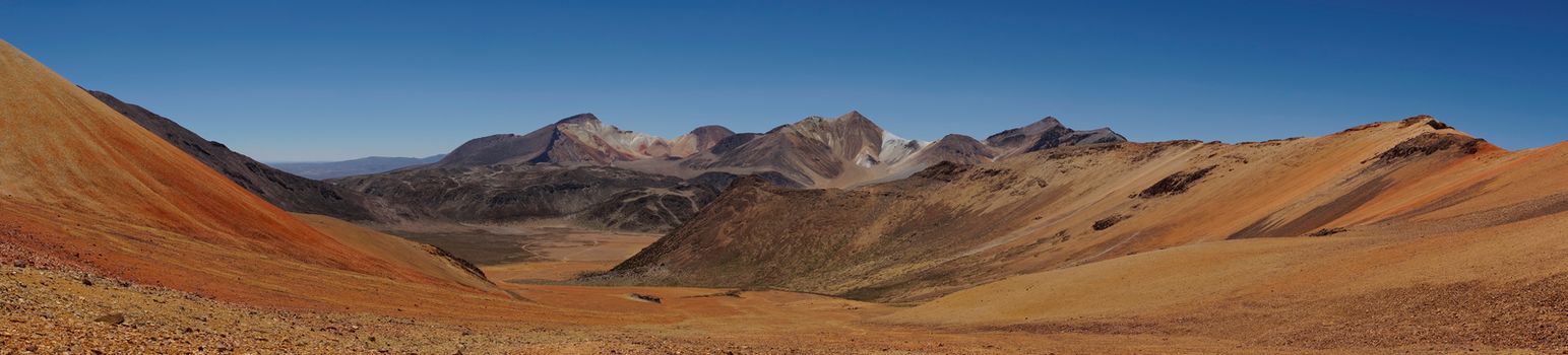 Colourful mountain landscape at Suriplaza in the Atacama Desert of north east Chile. The altitude is in excess of 4,000 metres.