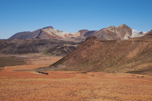 Colourful mountain landscape at Suriplaza in the Atacama Desert of north east Chile. The altitude is in excess of 4,000 metres.