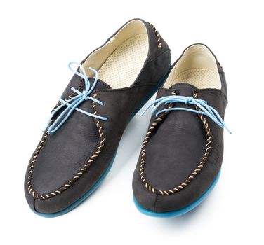 Black men's leather loafers with blue soles and laces on a white background