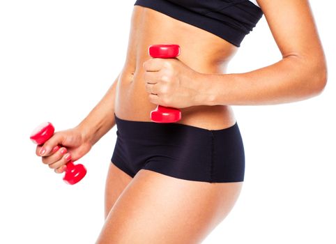 Beautiful slim woman with dumbbells, isolated on white background