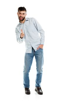 A young bearded man smiling with a finger up isolated on white background