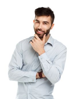 A young bearded man smiling isolated on white background