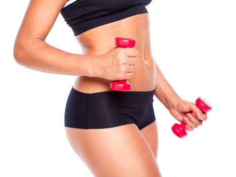 Beautiful slim woman with dumbbells, isolated on white background