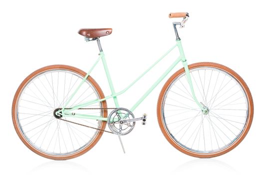 Stylish green female bike with brown wheels on white background