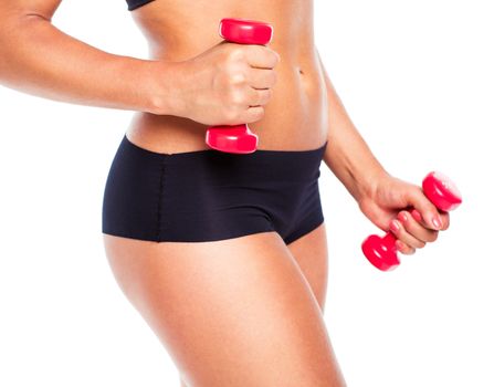 Beautiful slim woman with dumbbells, isolated on white background